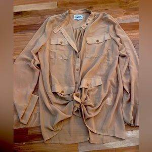 Tan blouse with tie on bottom